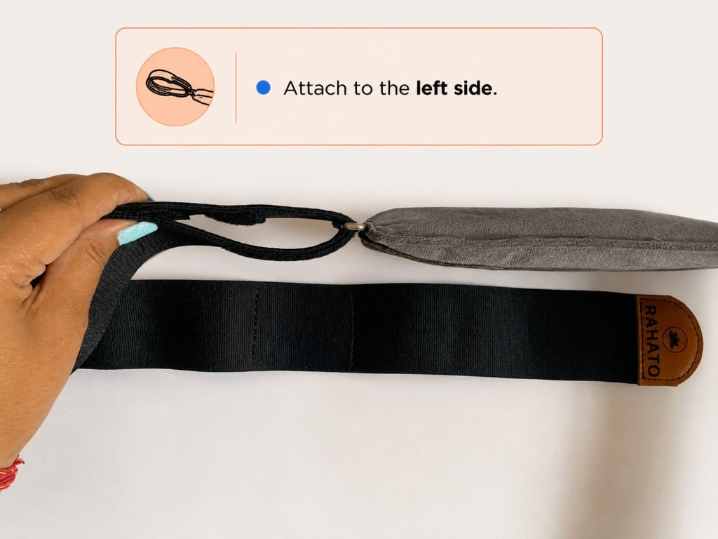 Attach the belt to the left side of the heating pad